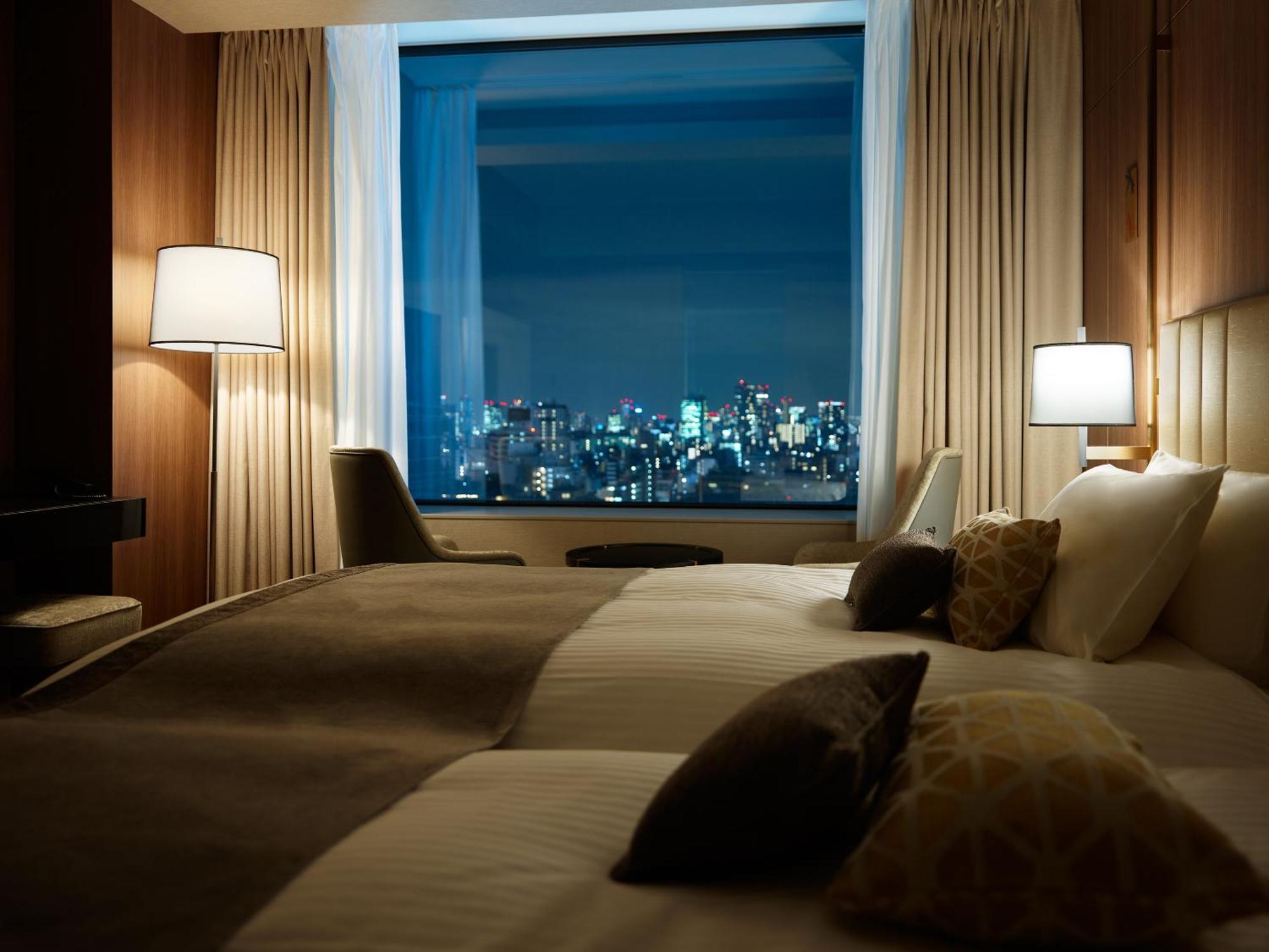 Mitsui Garden Hotel Roppongi Tokyo Premier Esterno foto A bedroom at the Mandarin Oriental, Tokyo